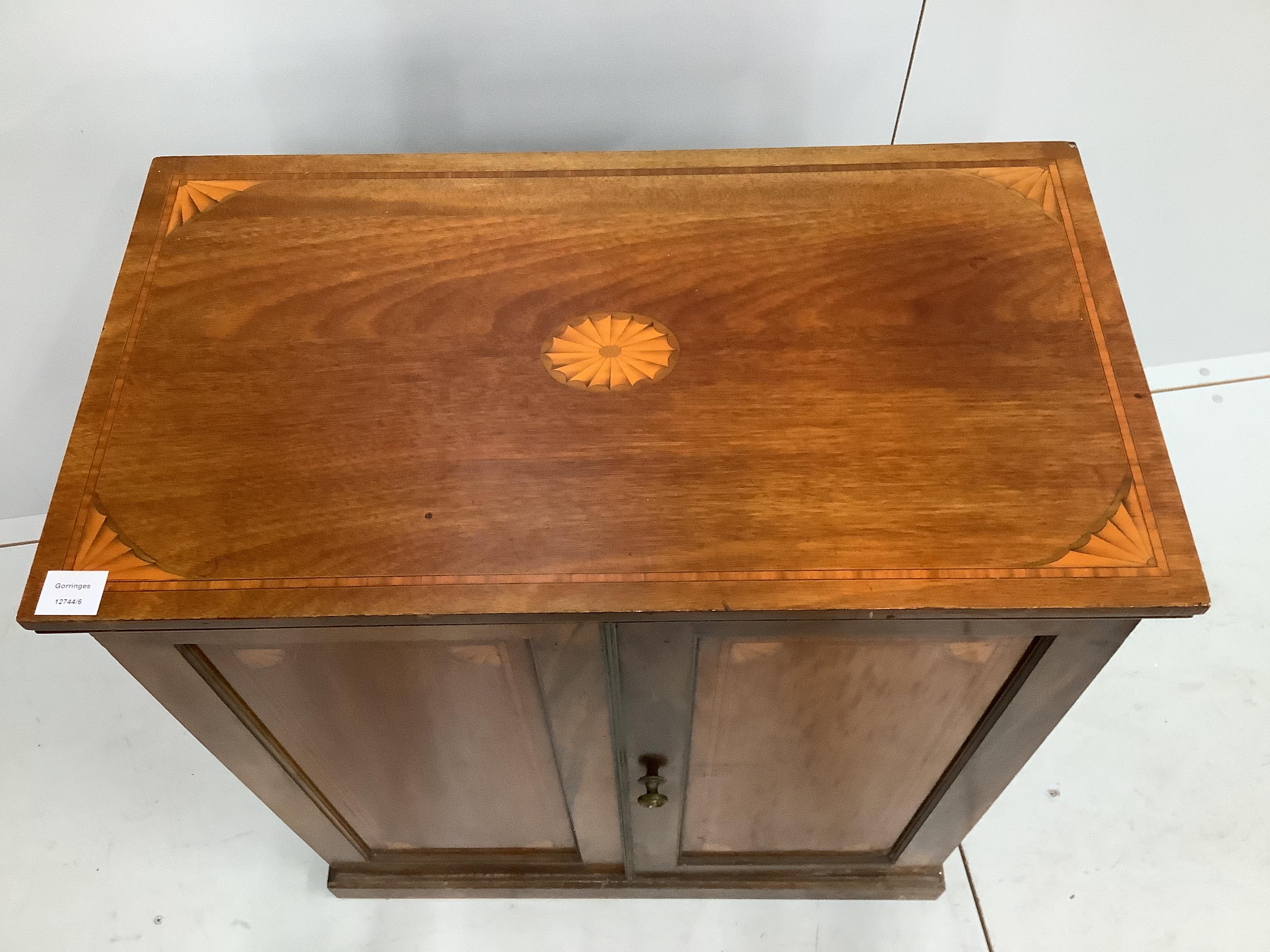 An Edwardian marquetry inlaid cross banded mahogany side cabinet, width 76cm, depth 42cm, height 85cm